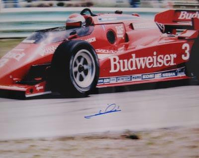 MARIO ANDRETTI SIGNED 16X20 PHOTO - BUDWEISER CAR LEFT